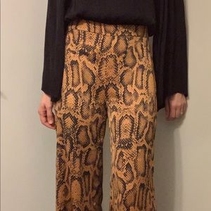 Like new ZARA snake skin print high waisted wide leg trousers. Size M.